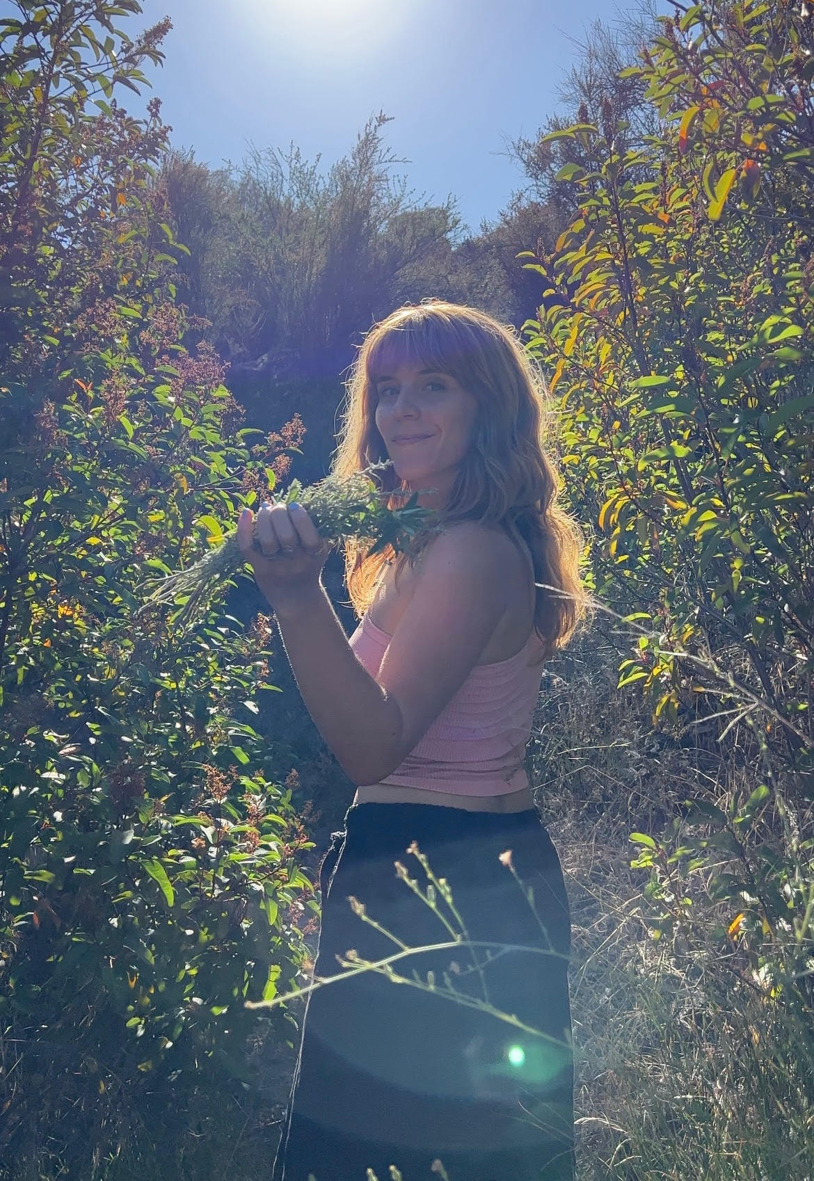 Sophie Cozine standing in herb field
